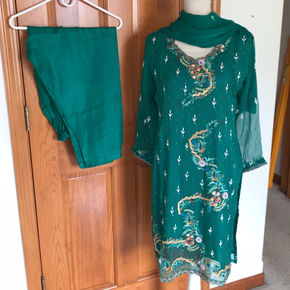Pakistani Shalwar kameez hand made very fine embroidery on pure sefoon and silk.